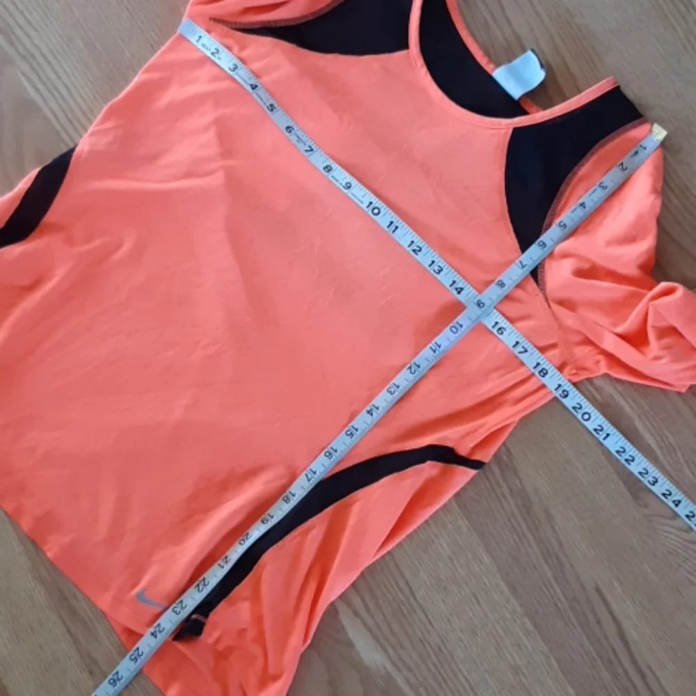 Nike long sleeve orange top w/ black mesh large